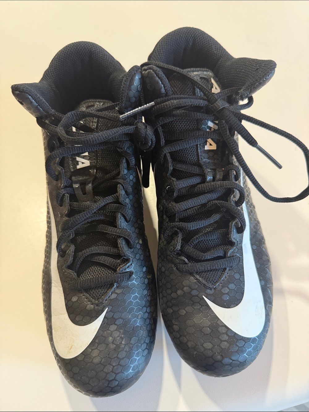 Nike Black Athletic Cleats with White Swoosh